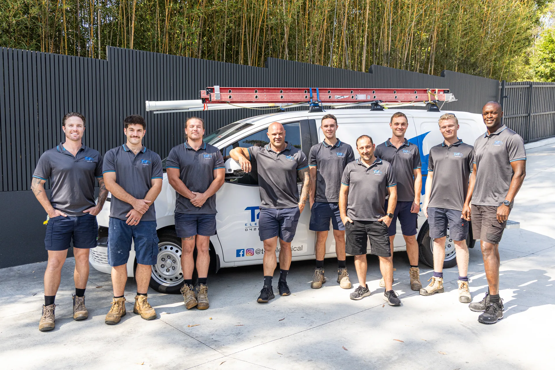 The Family Electrician Mermaid Beach team with a service van